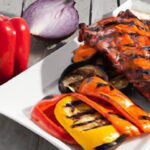 Grilling vs. Smoking: Unpacking the Art of Outdoor Cooking